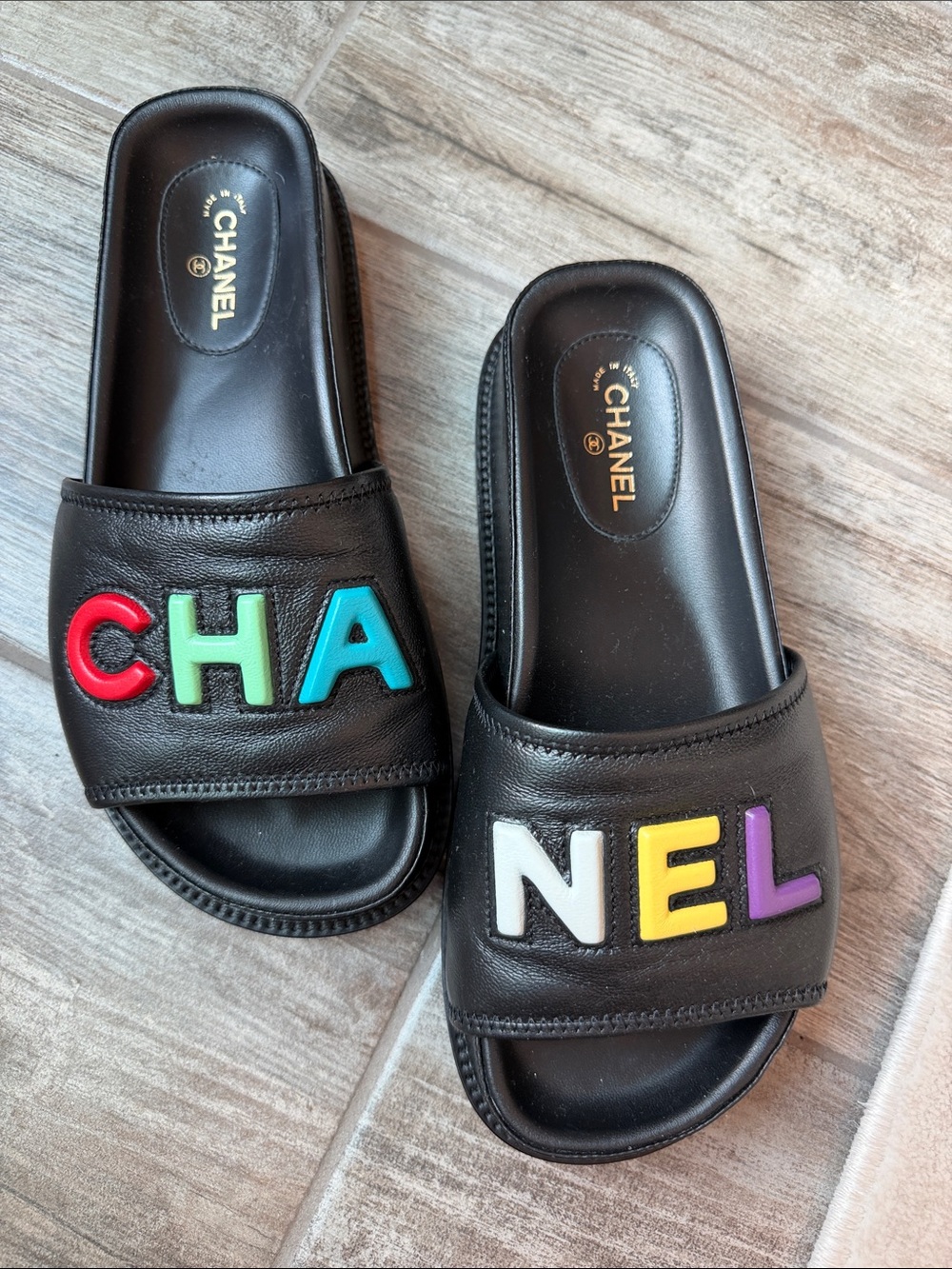 CHANEL Black Leather Slide Sandals with Multicolor Logo Letters